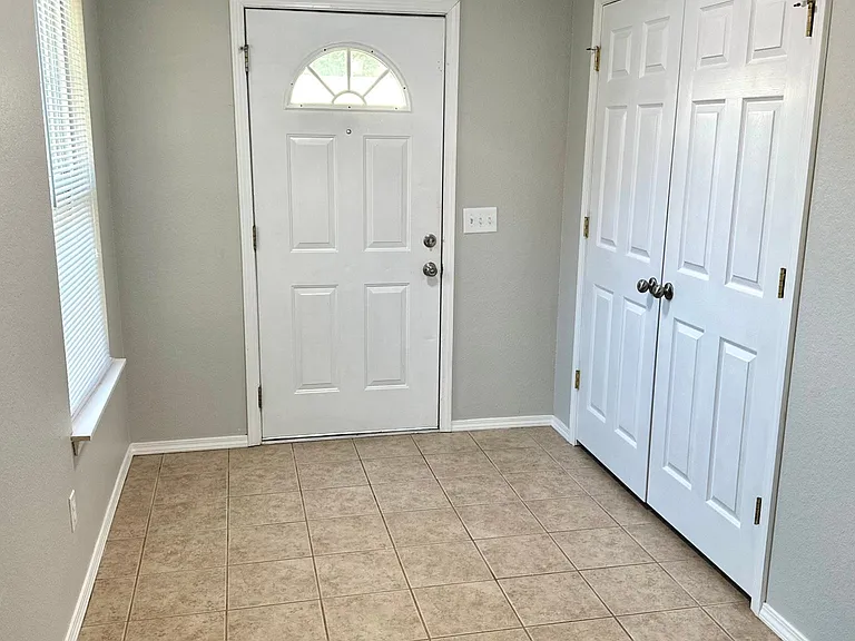 Front entryway with large coat/storage closet
