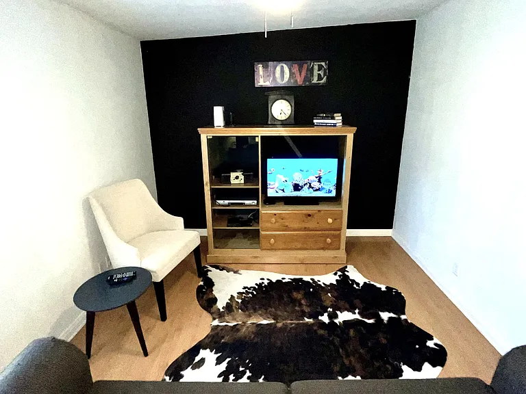 Third Bedroom off Master is Furnished With a Second Media Center, Office Space and Queen Sleeper Sofa.