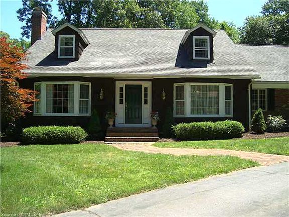 Gorgeous 4 Bed  3.1 bath Cape on a Beautiful 1.73 level Acres! Love the curb appeal and circular driveway