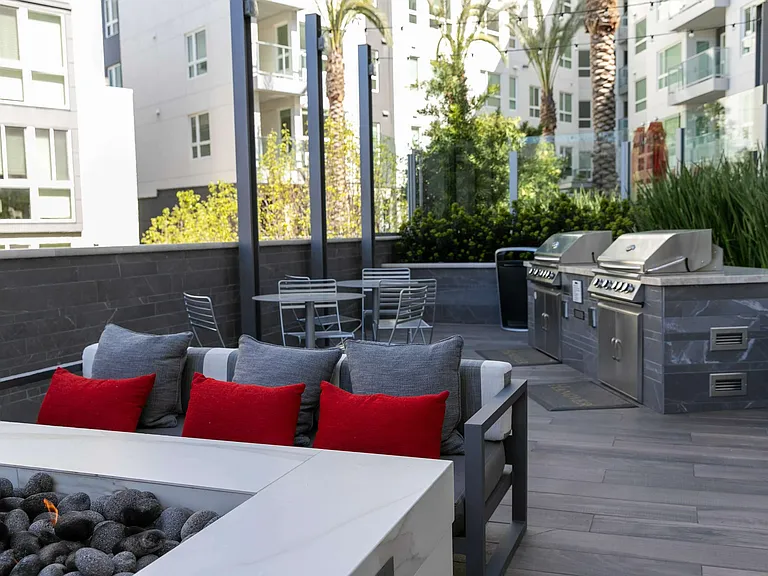 Fire up the grill and unwind under the palms.