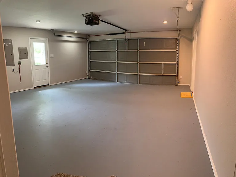 2 car garage with door exit on left
