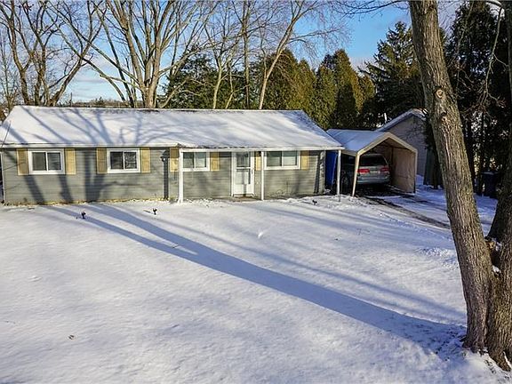 Large level frontage showcases the one level living of this ranch home.