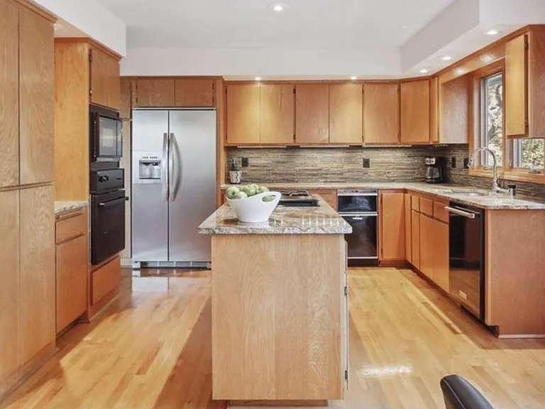 Great layout in kitchen with center stove top island and high-end appliances