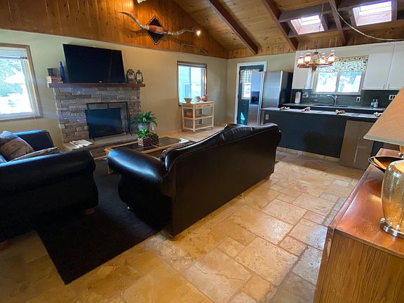 Front entry. Open living room and kitchen.