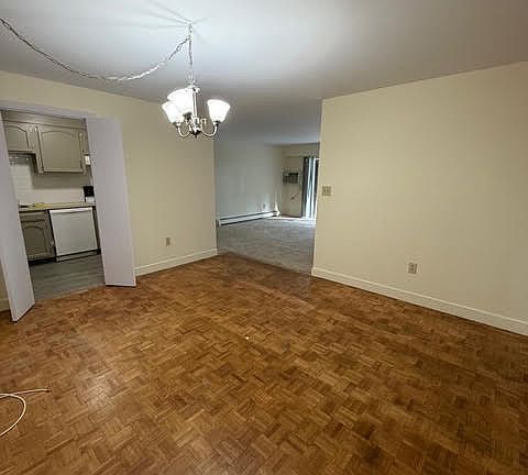 Nice sized dining room right off kitchen and living room area. Dining room has parquet floors.