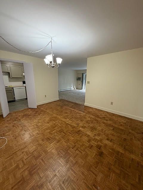 Nice sized dining room right off kitchen and living room area. Dining room has parquet floors.