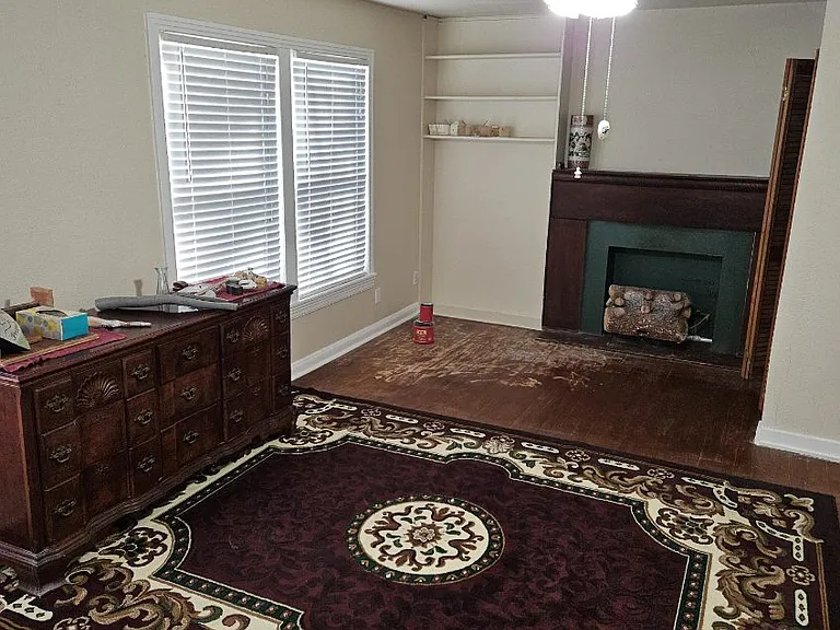 Large master bedroom with fireplace