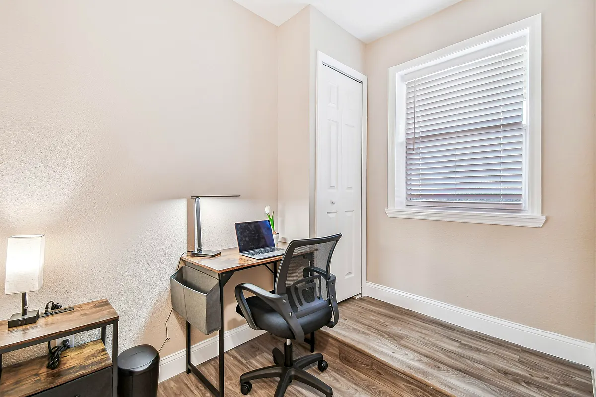 Desk, office chair and light - Fort Smith Blvd