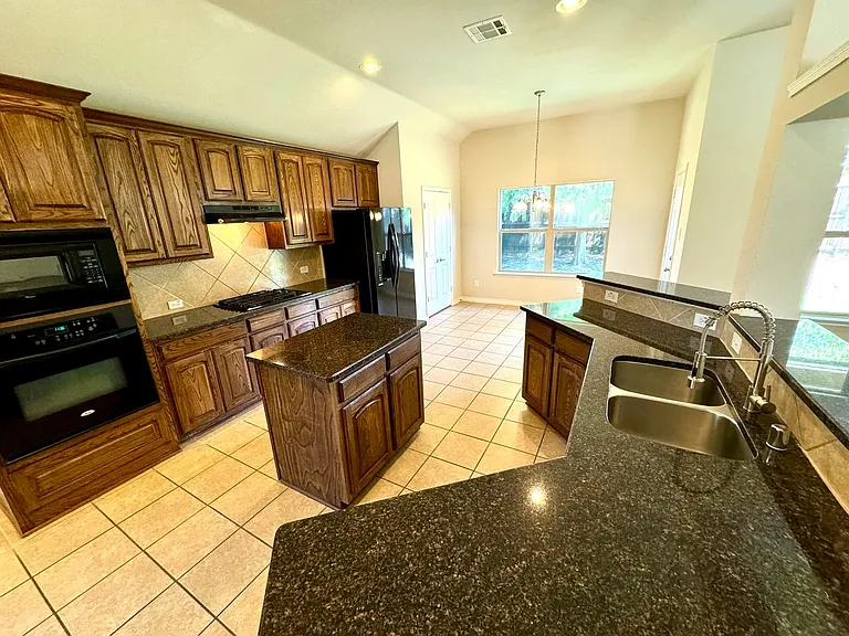 1703 Stonewick Dr — Photo 4