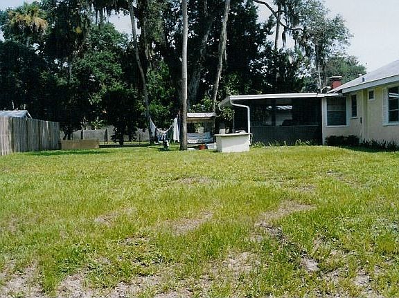 Another back yard view of Florida room (before fence & hot tub installed)