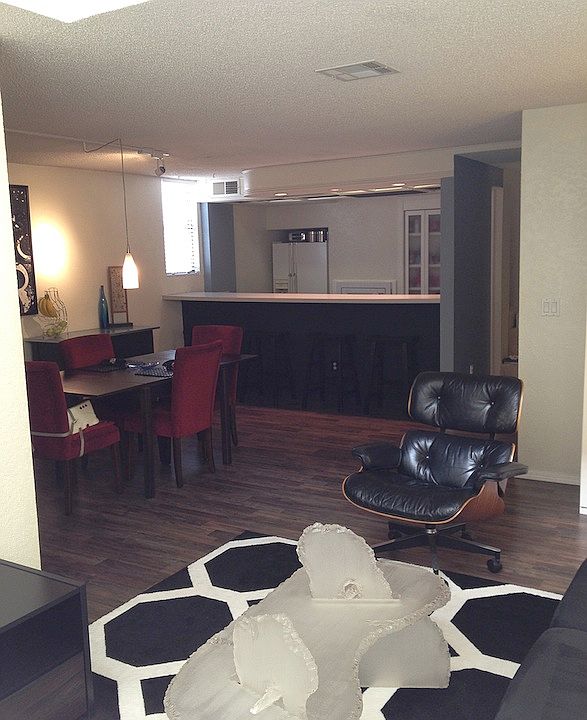 view from living area to dining room and kitchen bar