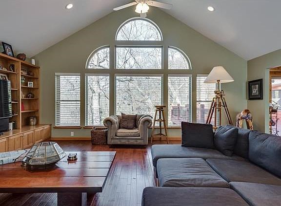Wonderful Great Room....wall of windows with Palladian accents!