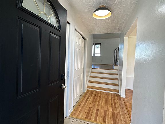 Entrance, huge den with full bath on your right