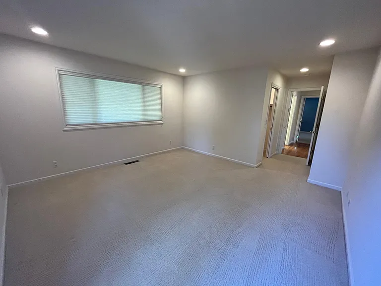 Bedroom #2 has a walk-in closet and comfortable plush carpeting.