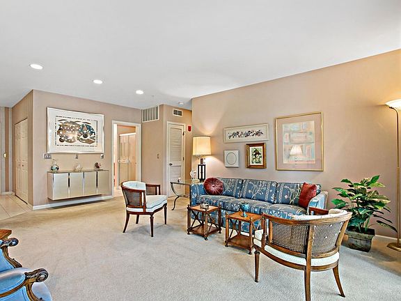 A welcoming foyer with a roomy guest closet is open to the gracious 20x15 living room