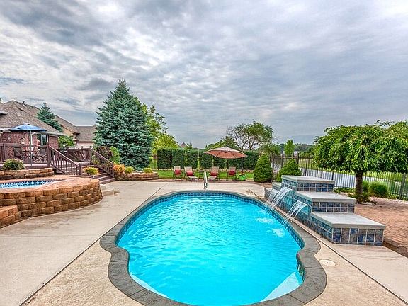 Pool with waterfall feature