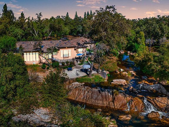 Backyard with river that flows all year