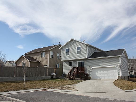Rear of Home w/ Garage Door