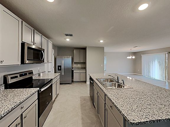 5th image of 603 Sunlit Coral St