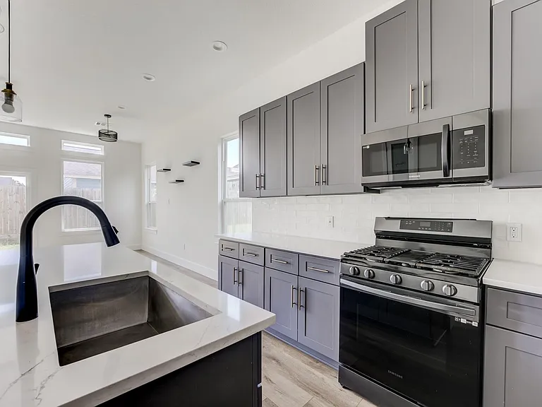 7117 Tierwester St — Photo 11