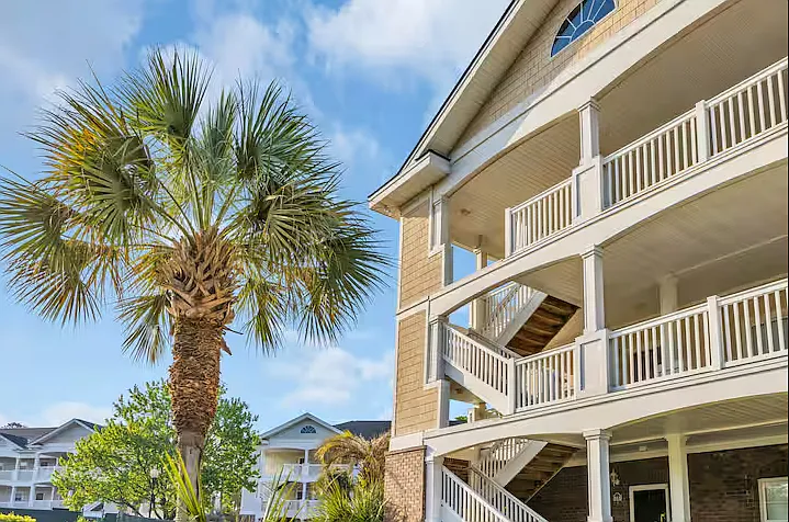 We are a third-floor walk-up end unit with vaulted ceilings and a private balcony in Wedgewood.