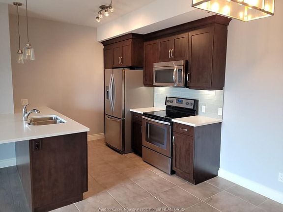 5th image of 8475 Wyandotte St E #406