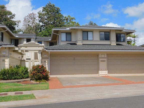 Two-story 2 bedroom, 2.5 bath 1,369 sq. ft. townhome with 2-car enclosed garage