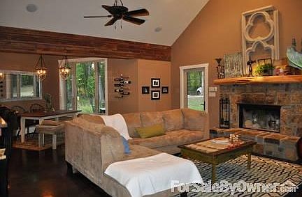 Living & Dining Area
						:
						Rock fireplace with solid cedar mantle