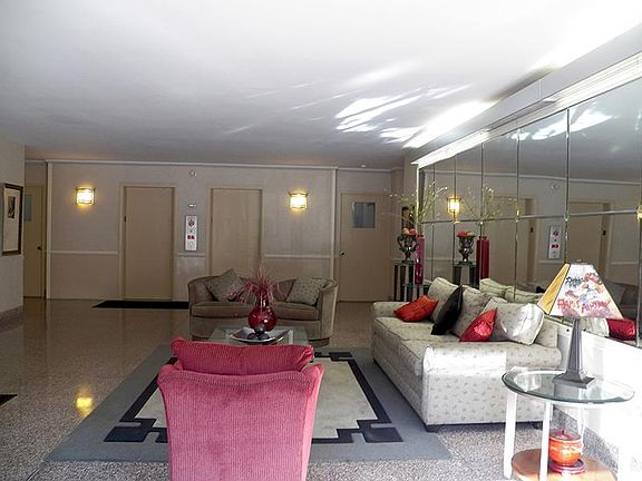 Panoramic tree-top views from this Penthouse apart