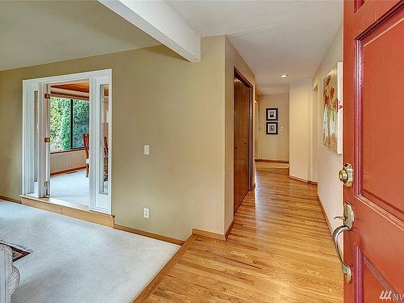 Gorgeous Oak Hardwood Floors Throughout The Hallways And Kitchen. Fresh Interior Paint.