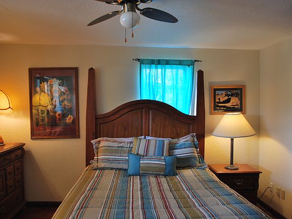 Queen bed in bedroom