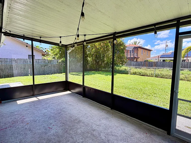 6048 Garrett St — Photo 40