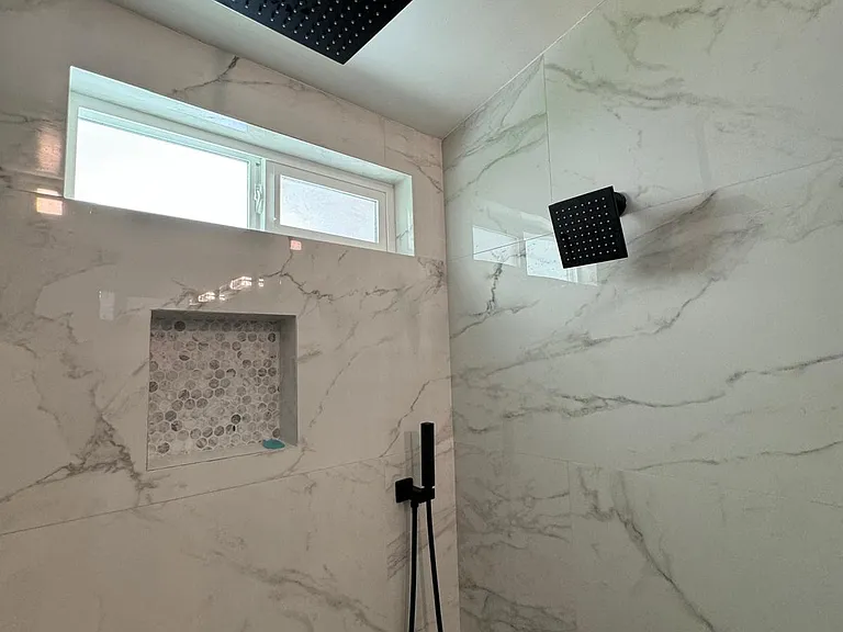Master shower back - three shower heads.