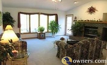 Vaulted Living Room with Brick Fireplace