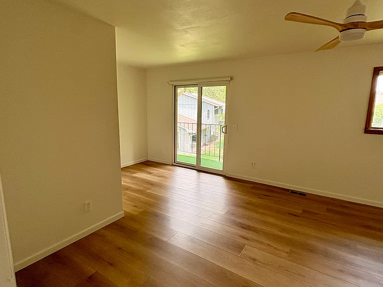 bedroom with balcony first floor