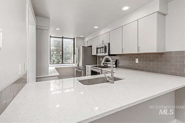 Large counter top with room for bar stools