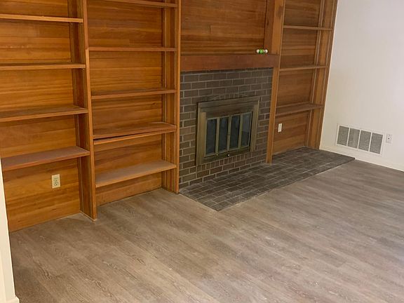 Living room & wood fireplace
