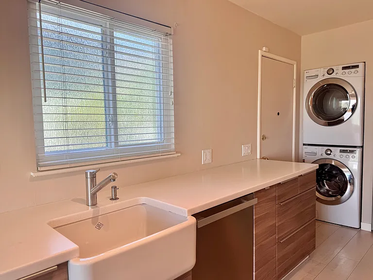 ...a Miele dishwasher and ceramic farm sink for effortless clean-up...