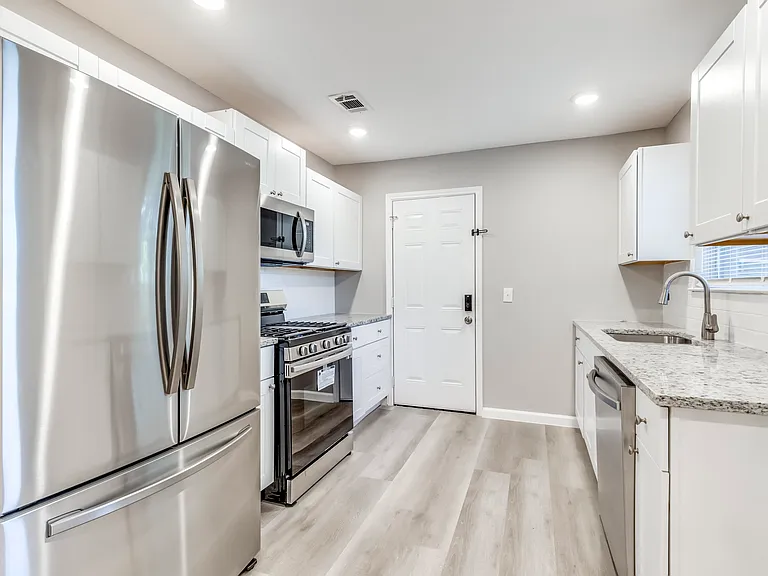 Kitchen with Refrigerator #1, Stove, Microwave, Sink and Dishwasher. Abundance of Cupboards.