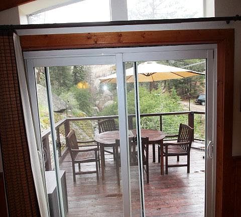 Second floor deck in top unit as well as a large deck with hot tub on that same floor via exit out of pantry/utility area.