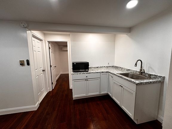 Kitchenette/bar
oven/microwave 
sink
cabinetry