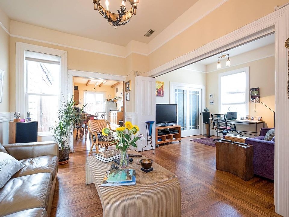 Open plan floor - Living room and Media room. Comfortable couches and chairs. Relaxing atmosphere.