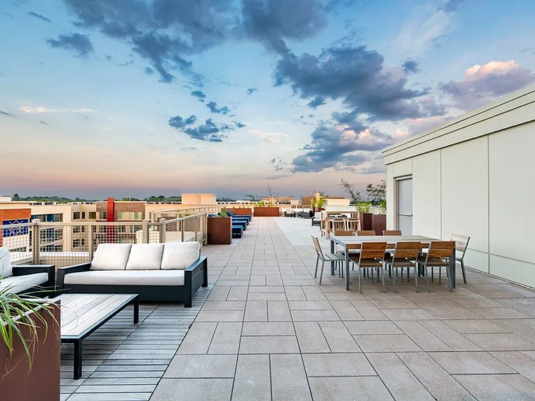Active rooftop observation deck with city views