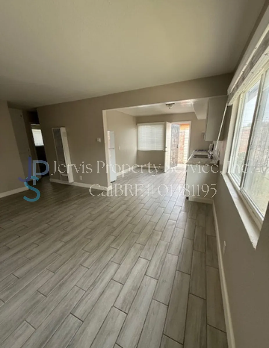 Building Photo - 4638 Florence Ave #J