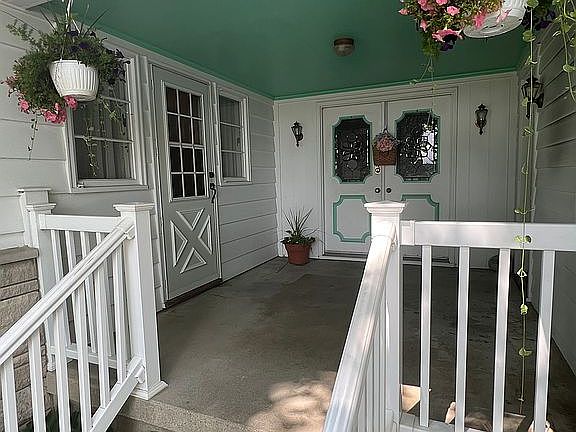 Covered porch; vinyl railing