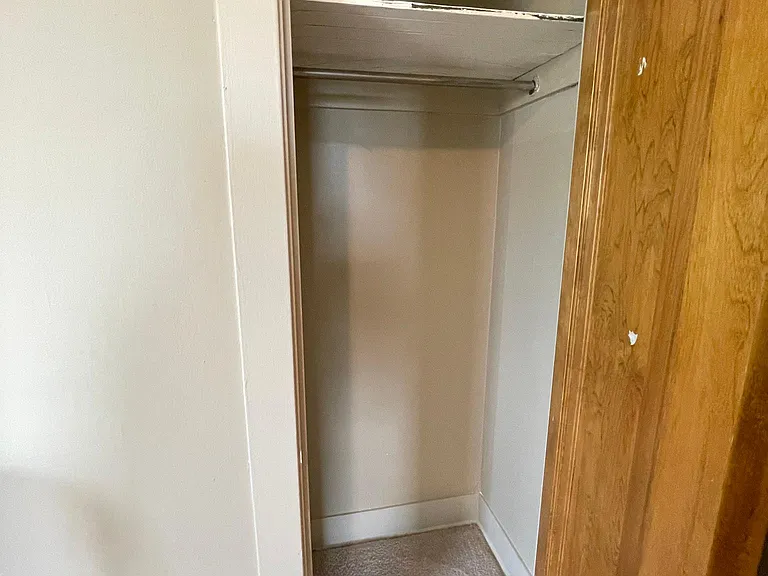 1st bedroom-- near front entrance door, adjacent to LR