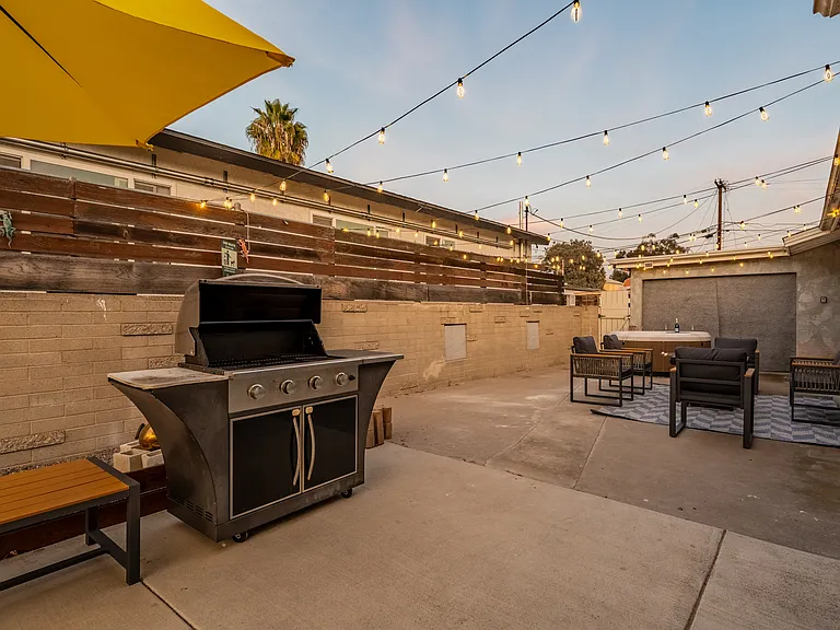 Fire up the barbecue grill and enjoy a delicious meal alfresco, with plenty of space to relax and unwind in the comfortable seating area.