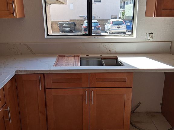 New cabinets counter tops, appliances and window covering on their way