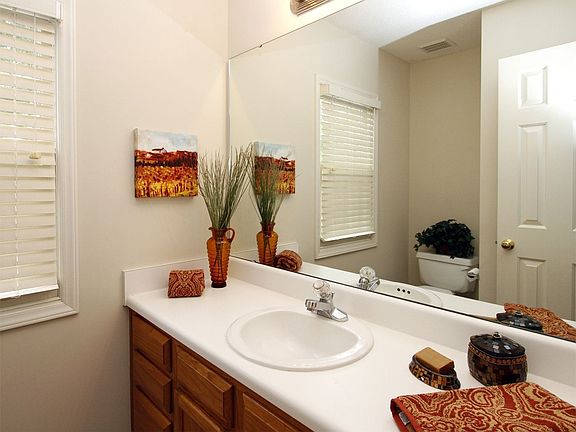 The first floor powder room in conveniently located.