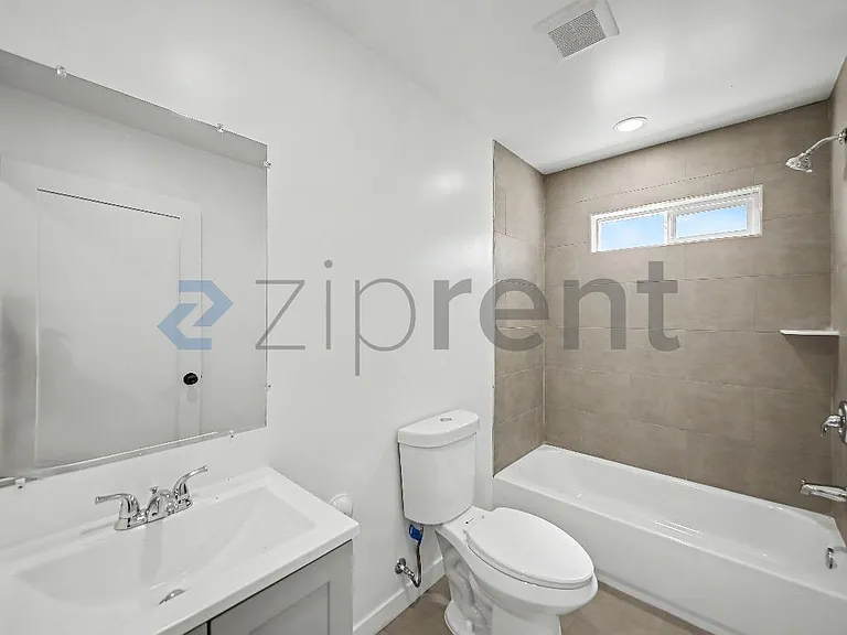242 1/2 E 97th St — Photo 5